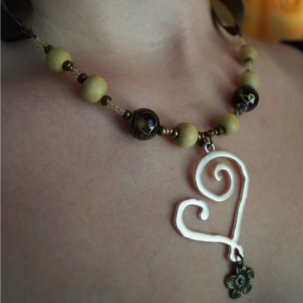 Heart charm beaded necklace with ribbon closure